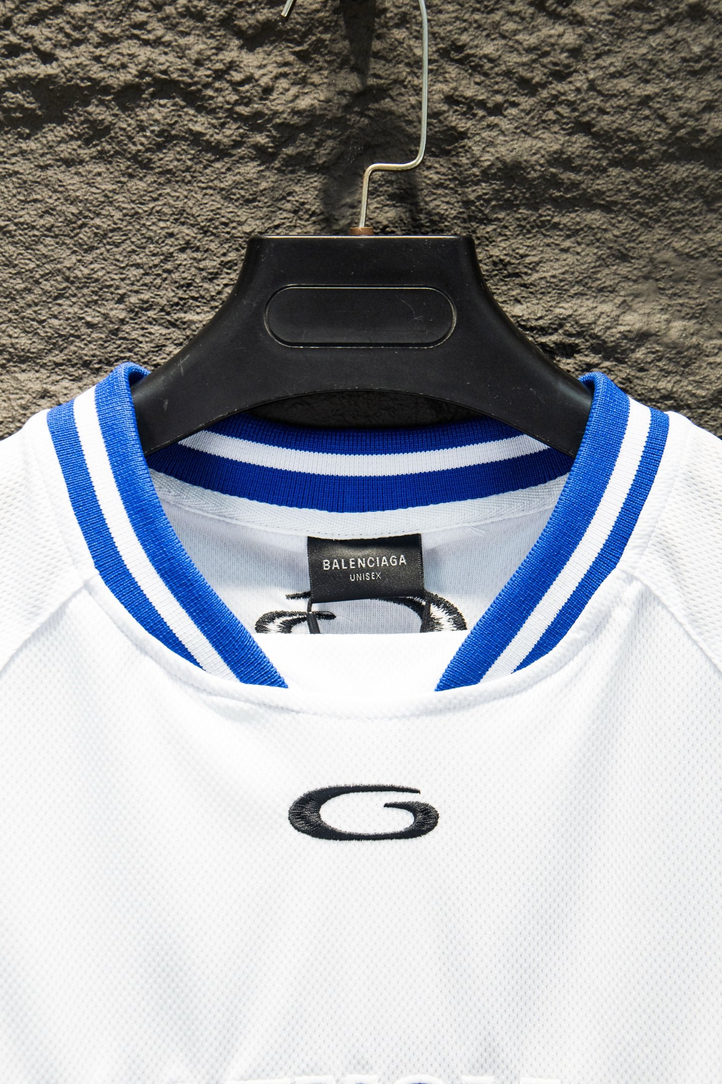 Balenciaga jersey collar with blue stripes and black G logo