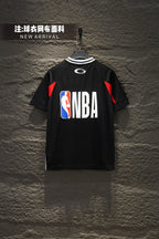 Black short-sleeve jersey with NBA logo and red shoulder accents