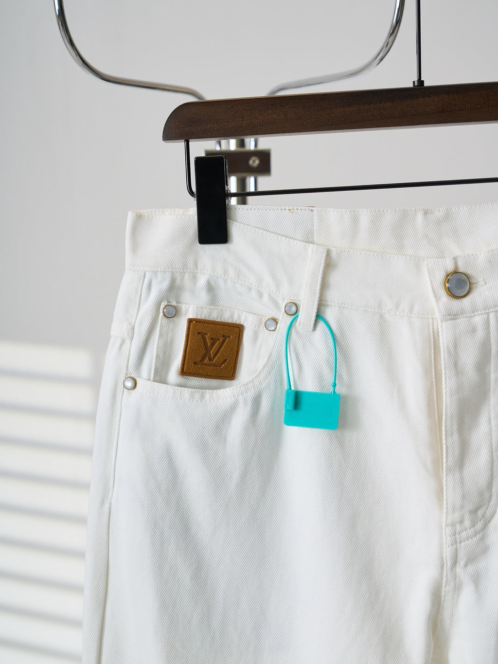 Louis Vuitton white denim pants with LV logo patch pocket and belt loops