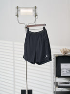 Louis Vuitton dark navy shorts with logo patch at right hem
