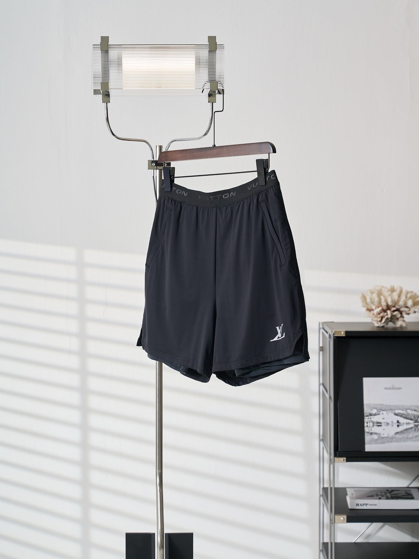 Louis Vuitton dark navy shorts with logo patch at right hem