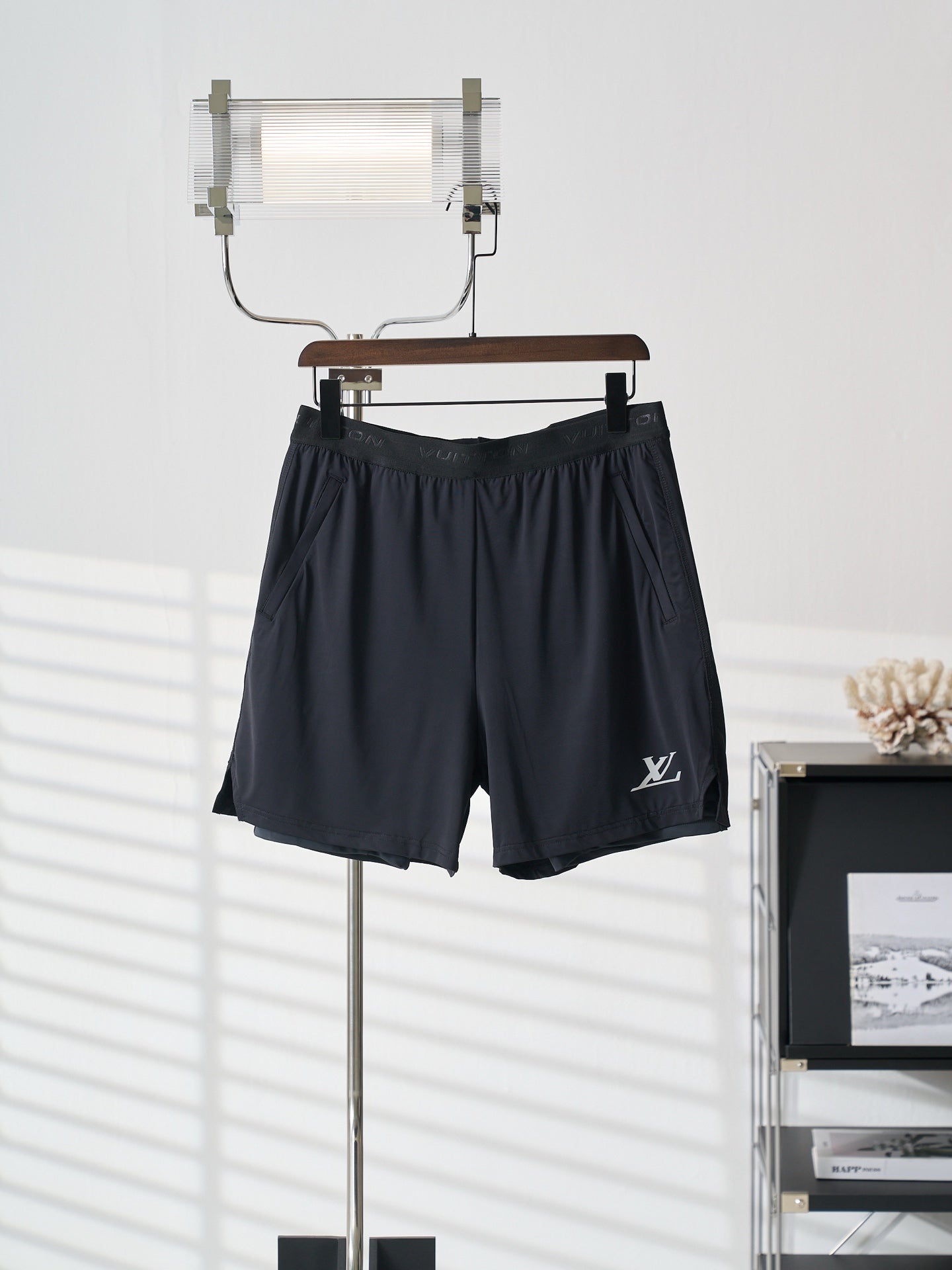 Louis Vuitton dark navy shorts with elastic waistband and side logo patch