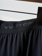 Louis Vuitton dark navy shorts waistband with repeating fabric logo text