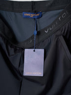 Louis Vuitton navy shorts front with drawstring and fabric logo detail