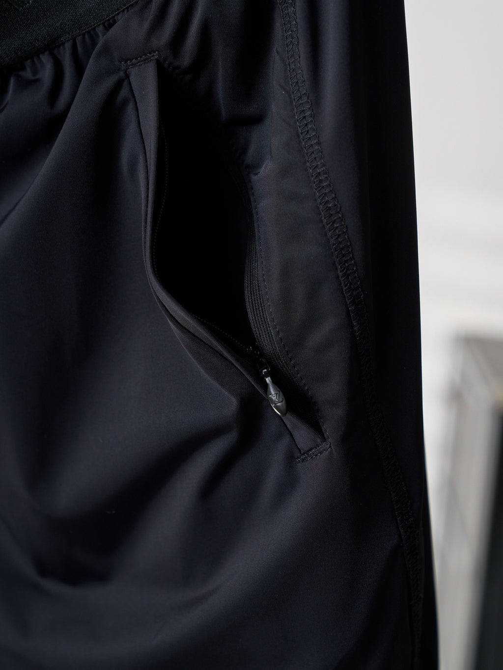 Louis Vuitton dark navy shorts with side pocket and angled stitching