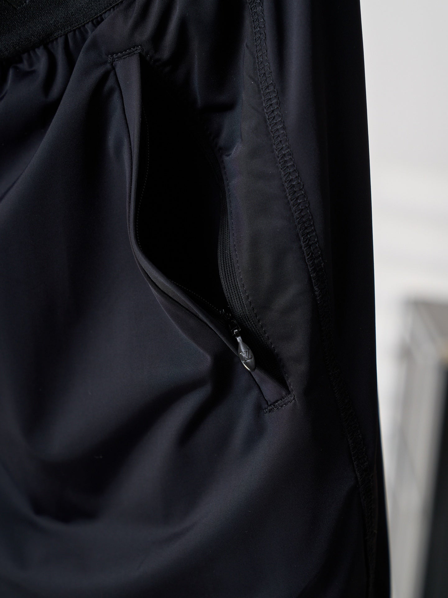 Louis Vuitton dark navy shorts with side pocket and angled stitching