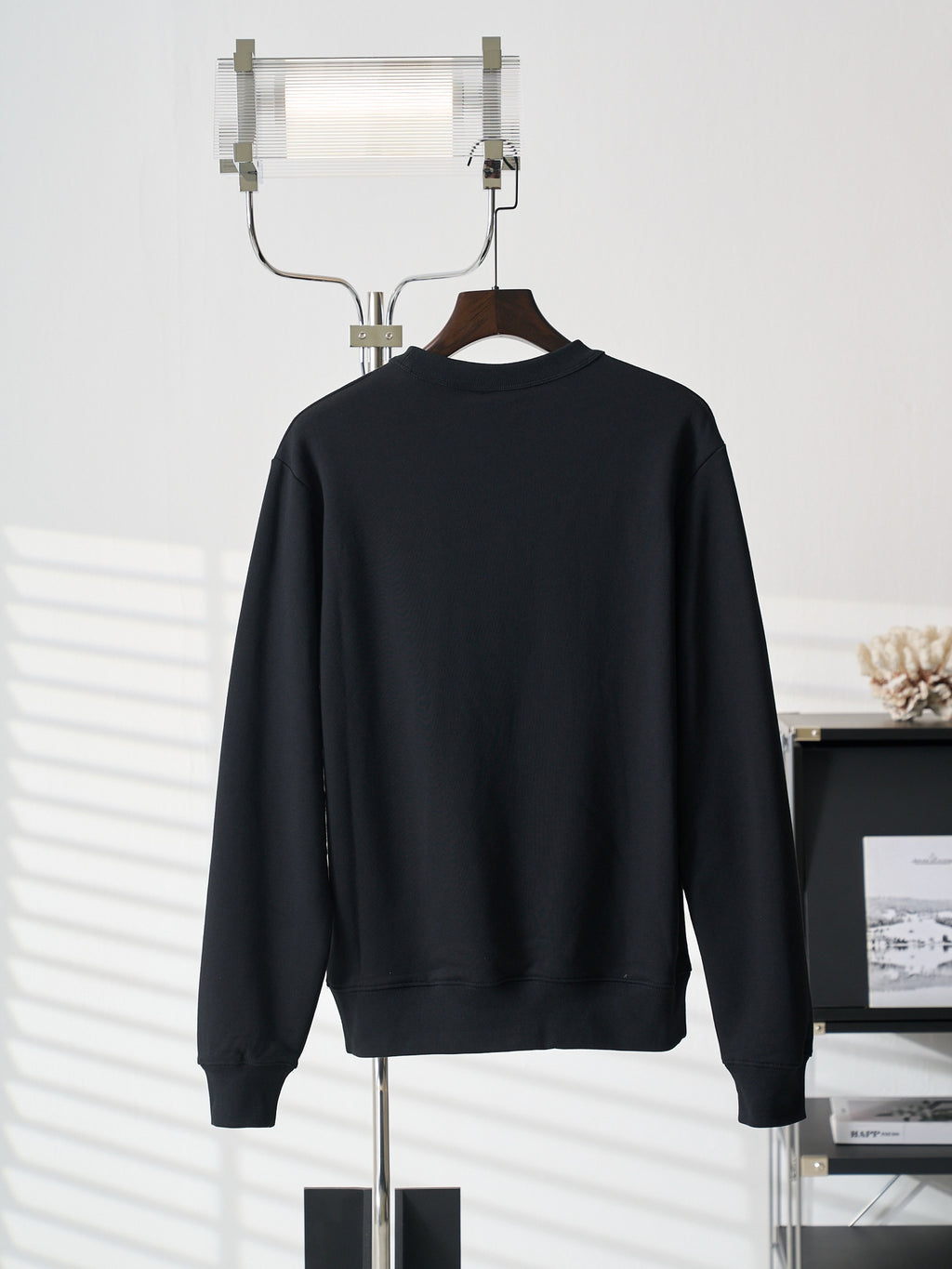 Black crewneck long-sleeve sweatshirt, plain back view