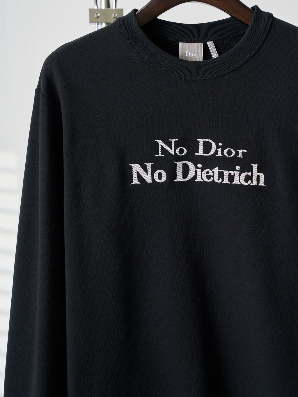 Black crewneck sweatshirt with 'No Dior No Dietrich' lettering on chest