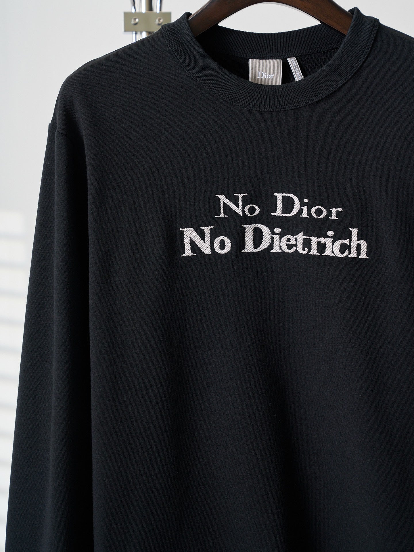 Black crewneck sweatshirt with 'No Dior No Dietrich' lettering on chest