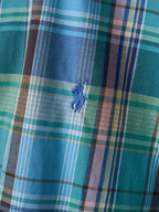 Turquoise plaid fabric with small embroidered polo logo