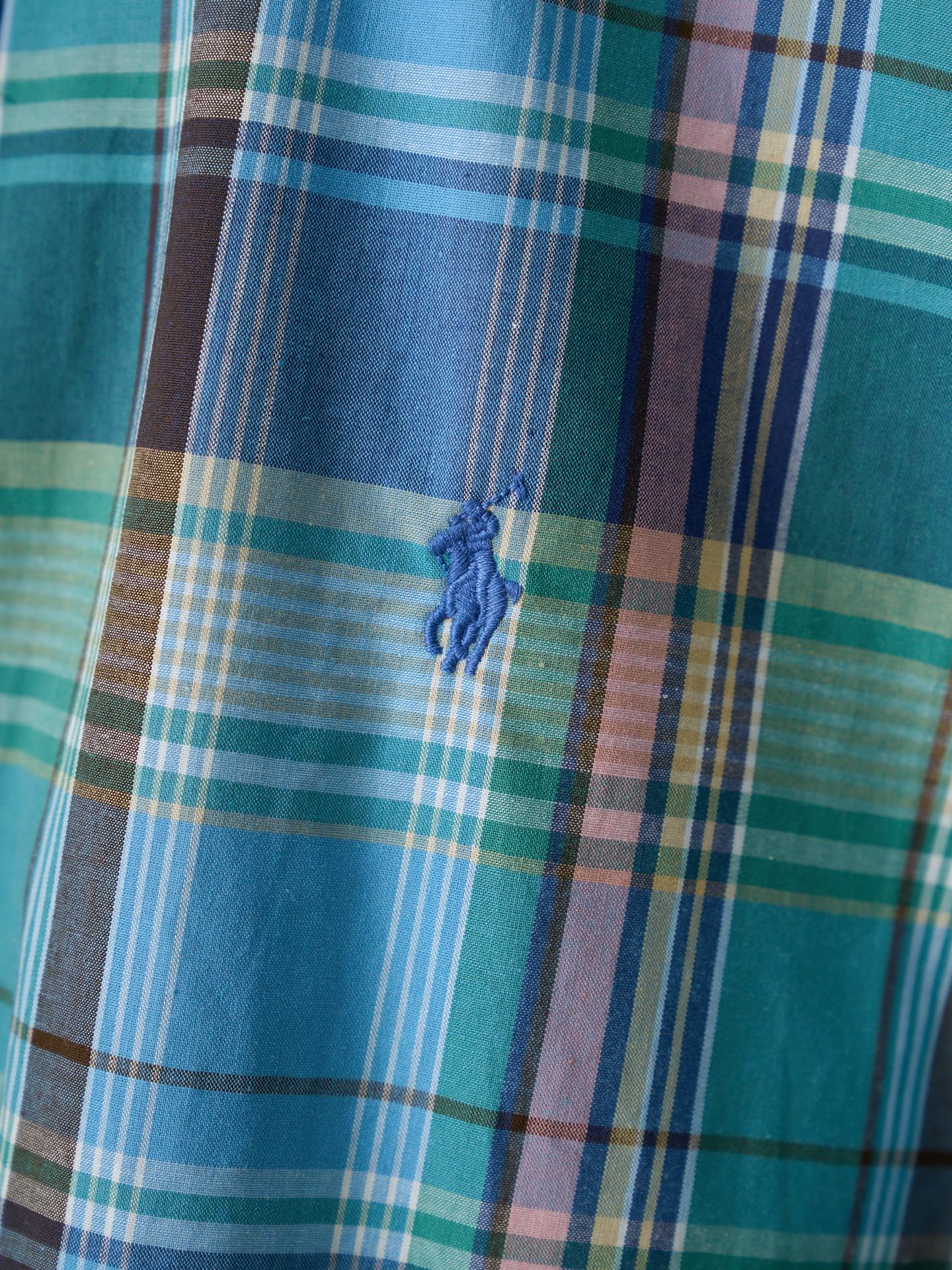 Turquoise plaid fabric with small embroidered polo logo