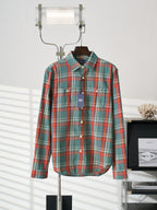 Plaid button-up shirt in teal with red, green, and white stripes; long sleeves
