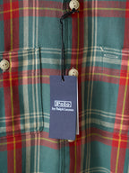 Teal plaid button-up shirt with hanging Polo by Ralph Lauren tag and white buttons