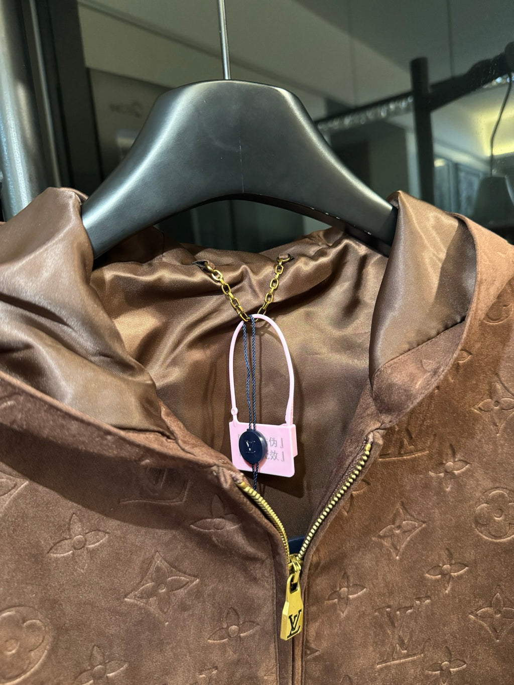 Louis Vuitton monogram hooded jacket, brown, hood lining with hanging tag and zipper pull