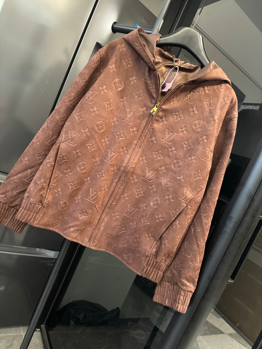 Louis Vuitton monogram hooded jacket, brown, front view with gold zipper