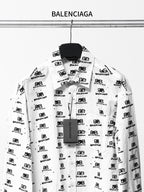 White long-sleeve shirt with black logo pattern, front view.