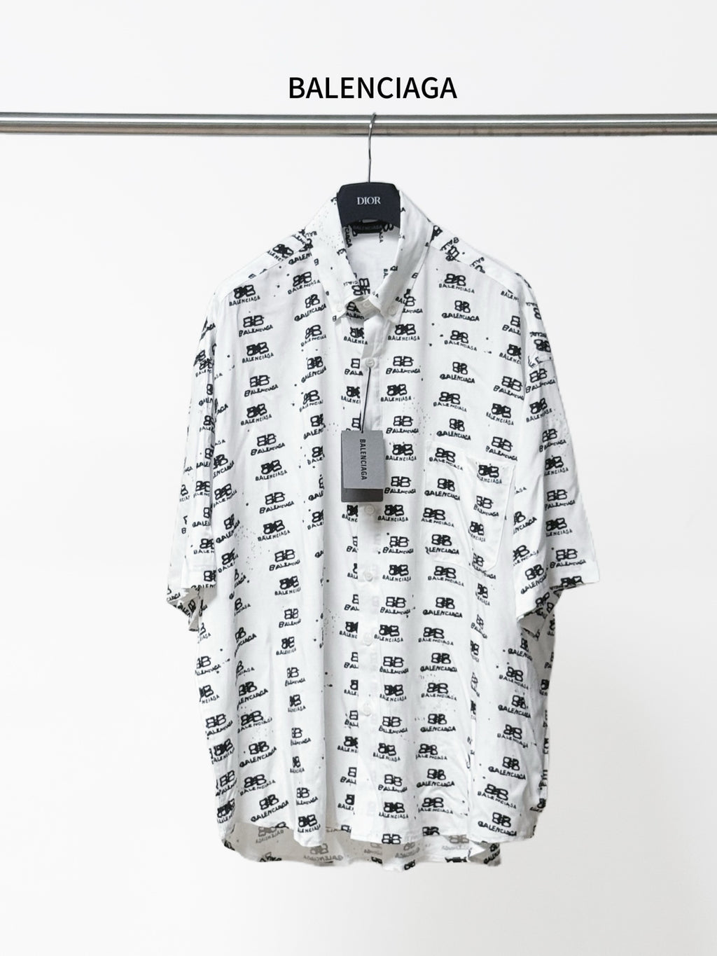 Balenciaga long-sleeve shirt in white with black logo pattern, button-front and collar
