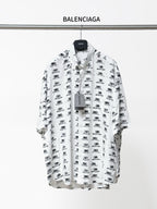 Balenciaga long-sleeve shirt in white with black logo pattern, button-front and collar
