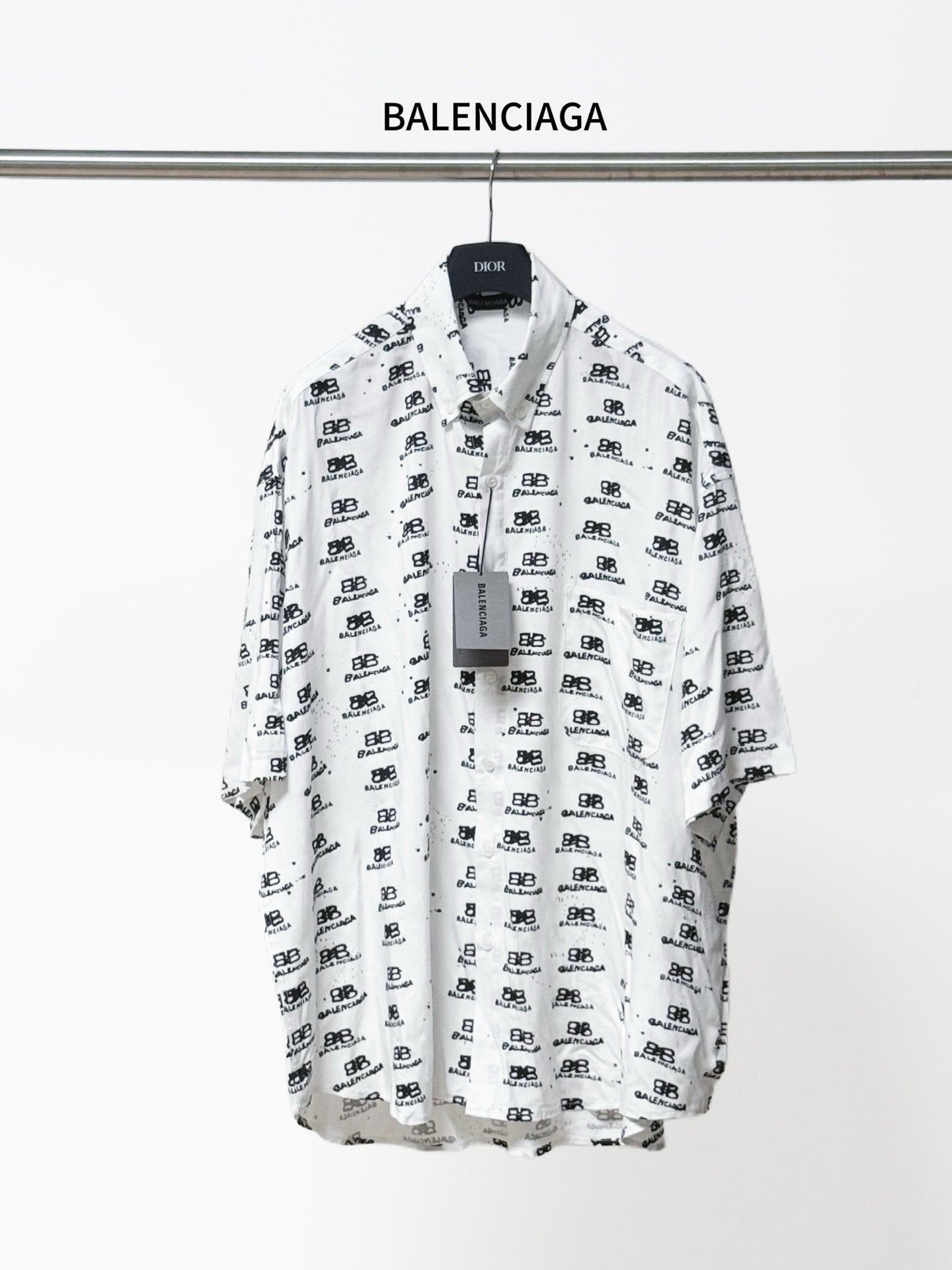 Balenciaga long-sleeve shirt in white with black logo pattern, button-front and collar