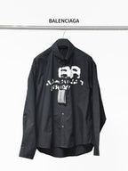 Balenciaga black long-sleeve button shirt with front skull graphic print