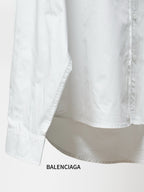 Balenciaga white long-sleeve shirt with straight hem and visible side seams