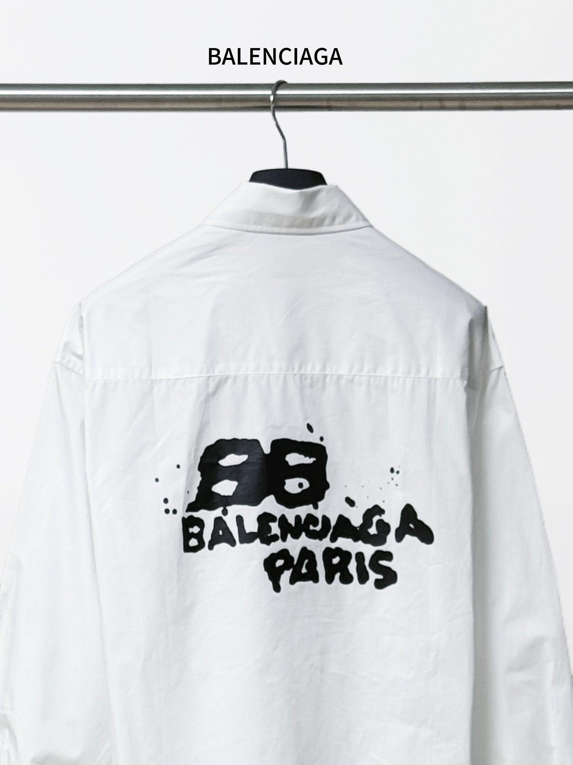 White Balenciaga button-up shirt back view with black Paris graphic