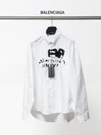 Balenciaga white button-up long-sleeve shirt with black graphic and neck tag