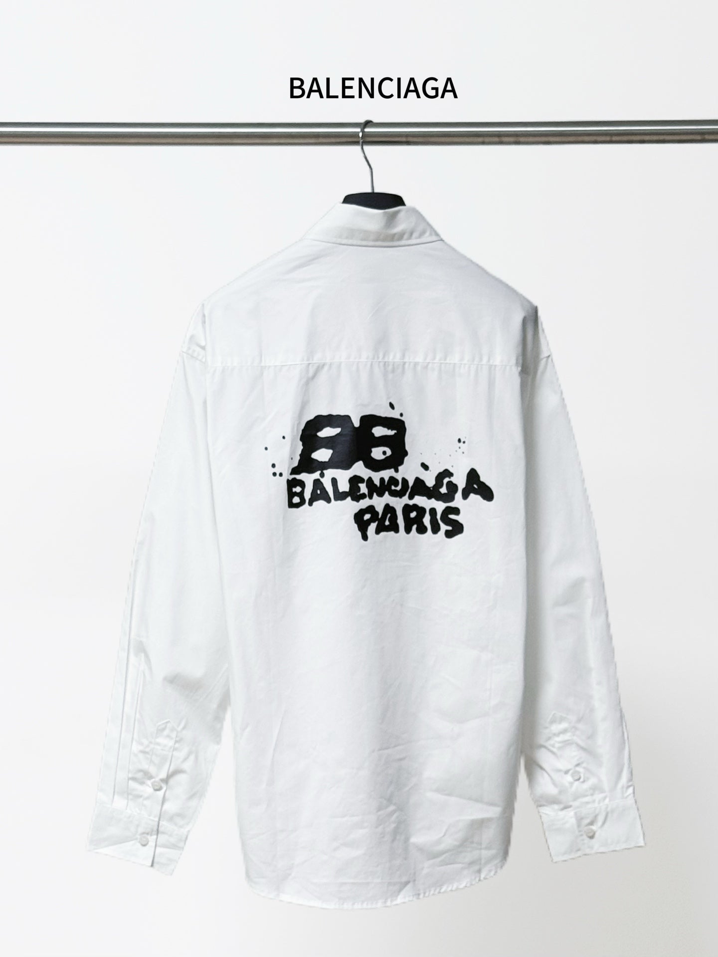 Balenciaga white long-sleeve button-up shirt with black 'BALENCIAGA PARIS' print