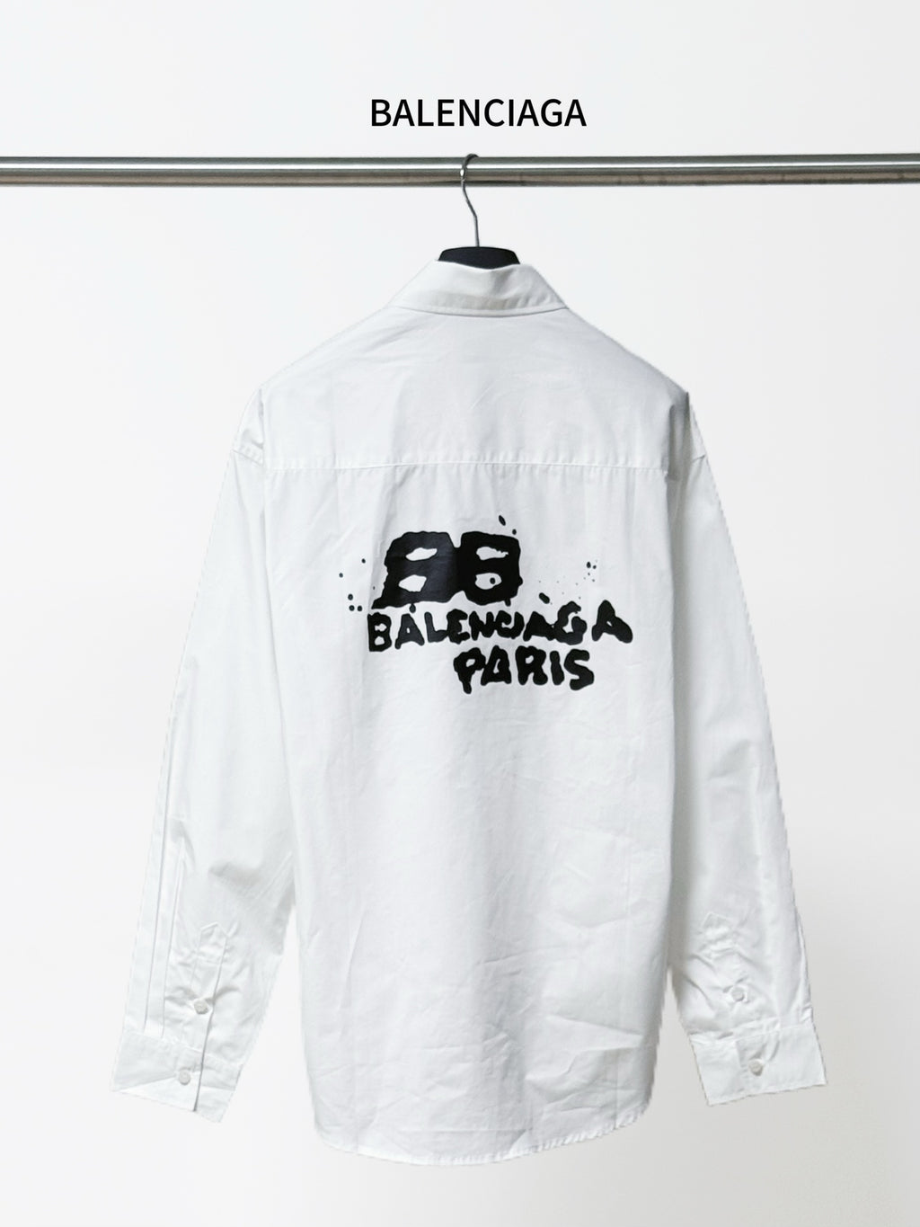 White Balenciaga long-sleeve button-up shirt with back black Paris graphic