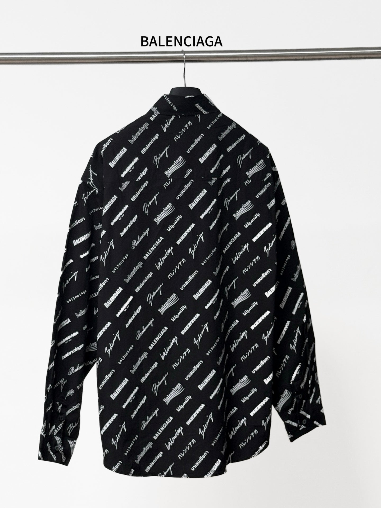 Long-sleeve shirt with allover white logo print, black collar and button front