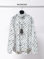 White long-sleeve button-up shirt with black Balenciaga logo and script print
