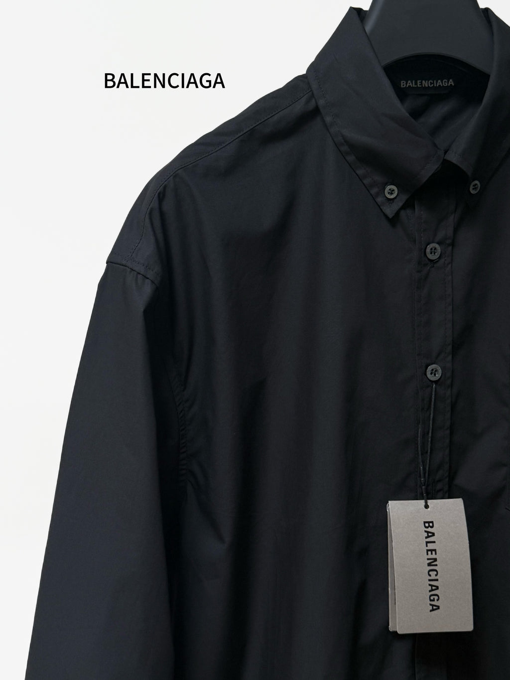 Balenciaga long-sleeve button-up shirt, black, point collar and front seam detail.