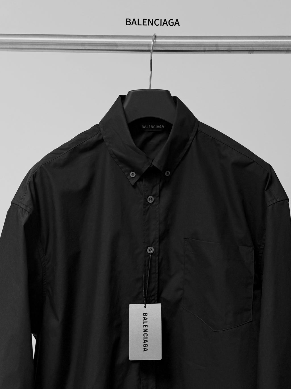 Balenciaga long-sleeve button-up shirt, black, button front and chest pocket.