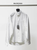 Balenciaga long-sleeve button-up shirt, white, pointed collar and chest pocket.