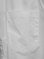 Balenciaga long-sleeve button-up shirt, white, chest pocket close-up with stitched edges.