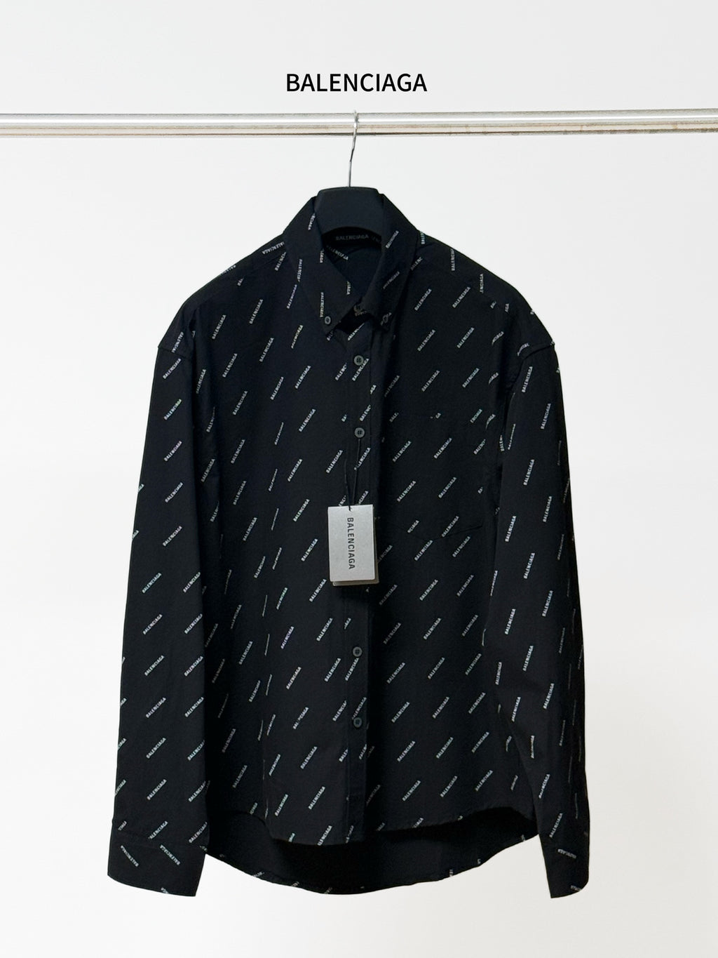 Balenciaga long-sleeve shirt in black with allover logo print and button collar