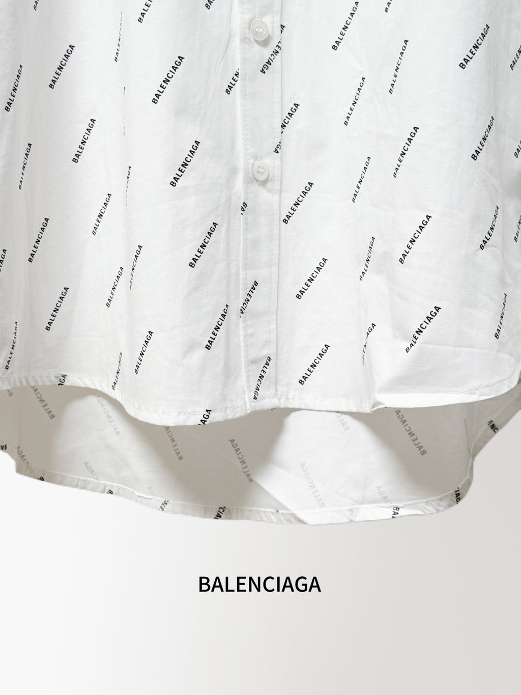Long-sleeve shirt lower hem with allover black logo print and curved bottom edge