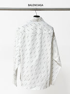Long-sleeve button-up shirt back view with allover black logo pattern and raised collar