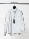 White Balenciaga long-sleeve button-up shirt with front pocket and logo sleeve prints