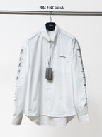 White Balenciaga long-sleeve button-up shirt with front pocket and logo sleeve prints