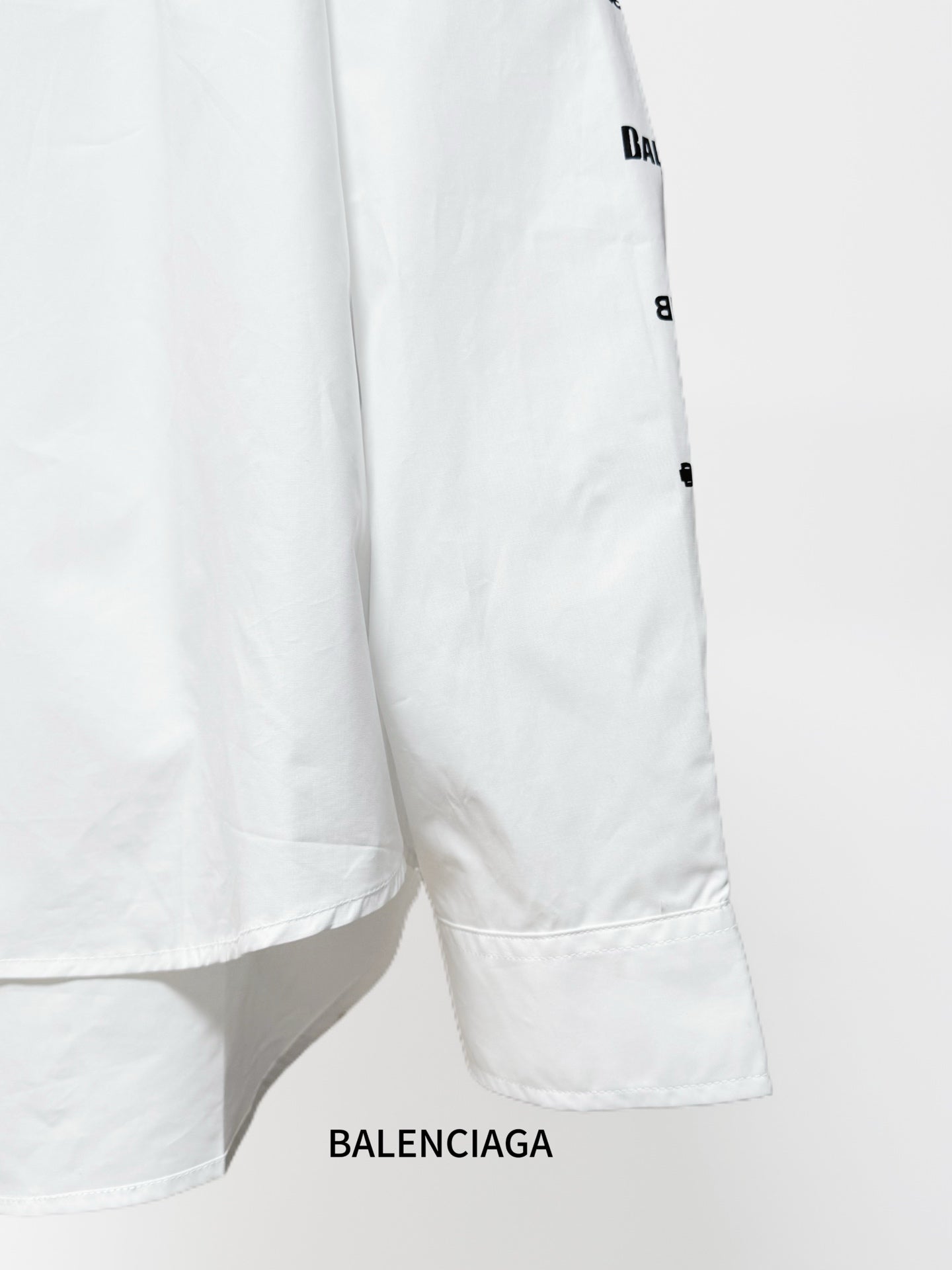 White Balenciaga long-sleeve shirt with logo print on sleeve and stitched hem
