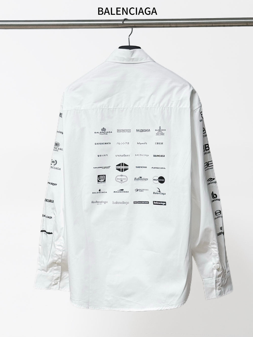 White Balenciaga long-sleeve shirt, back features graphic icons and text