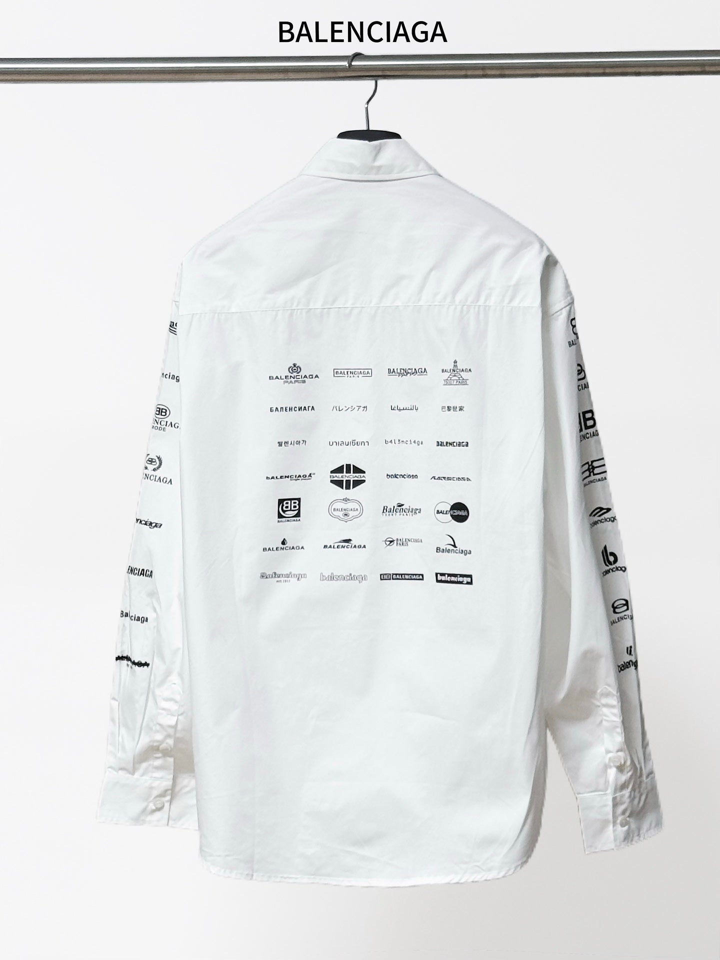 White Balenciaga long-sleeve shirt, back features graphic icons and text