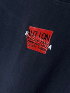 Navy T-shirt with close-up red square logo graphic print