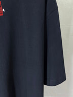 Navy short-sleeve T-shirt with visible side and hem stitching