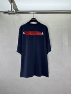 Navy short-sleeve T-shirt with wide red graphic text band across back