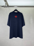 Navy short-sleeve crewneck T-shirt with small red graphic print on chest