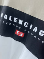 Balenciaga logo T-shirt close-up, black band with white lettering and red icon