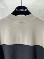 Balenciaga crewneck T-shirt, cream body with dark band near chest