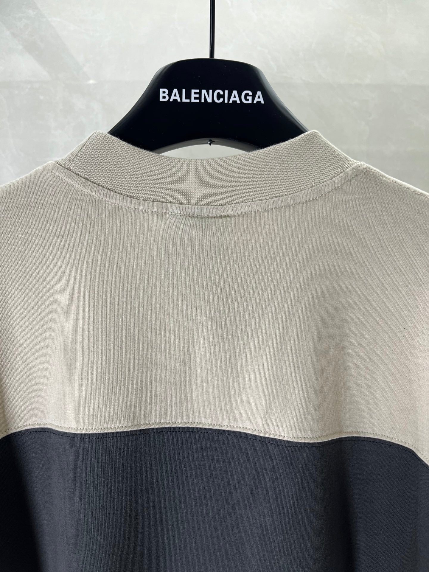 Balenciaga crewneck T-shirt, cream body with dark band near chest